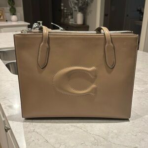 Coach Tan Tote with Structured Design and Embossed Logo